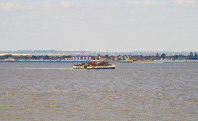 Historic Paddle steamer or boat on River Thames near London