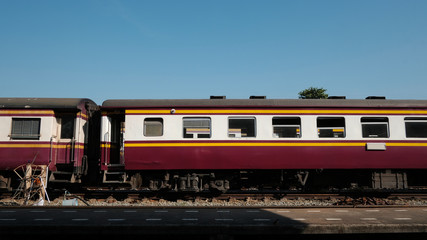 The Train car with the clear blue sky at Thonburi Railway Station in Bangkok Thailand