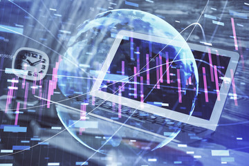 Financial graph colorful drawing and table with computer on background. Double exposure. Concept of international markets.