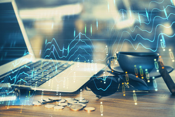 Double exposure of graph and financial info and work space with computer background. Concept of...