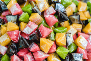 Thai Dessert: Kalamae,kind of Thai toffee like caramel.The Thai form being made of sugar, rice flour, and coconut cream, black in color, and eaten as a dessert rather than a candy.