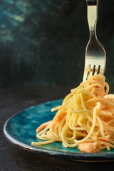 pasta shrimp (spaghetti cream sauce and seafood prawn) menu concept. food background. top view. copy space