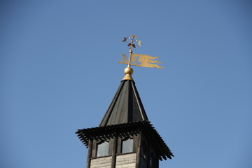 Fototapeta na wymiar One of the towers with a weather vane of the Tula Kremlin on a Sunny day. Tourism in Russia