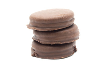 Fototapeta na wymiar Chocolate sandwich cookies filled and coated with chocolate cream isolated on white background.