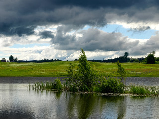 landscape with thunderstorms, lake and trees
