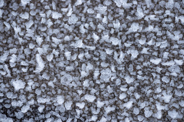 Texture macro of frost on a wooden Board