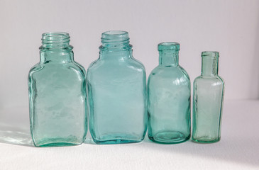 Glass bottles isolated on white background