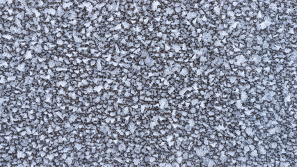 Texture macro of frost on a wooden Board