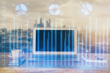 Double exposure of forex graph and work space with computer. Concept of international online trading.