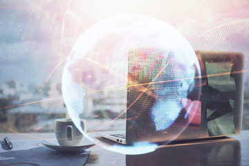 Multi exposure of business theme icons and work space with computer background. Concept of success.