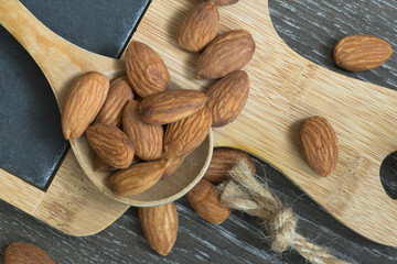 Fototapeta na wymiar BIO or organic Almond nuts background
