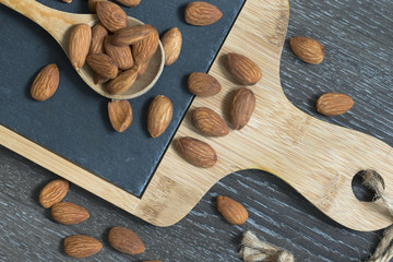 Fototapeta na wymiar BIO or organic Almond nuts background