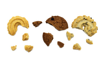 Collection of cookies or biscuit and crumbs with different flavor, chocolate chip butter, vanilla and black sesame. On white background.