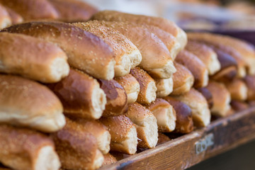 Fresh and crispy rolls. Delicious golden baguettes that smell wonderful! In the Mahane Yehuda market in Jerusalem.