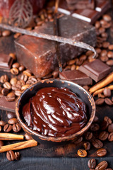 Chocolate body skin treatment on wooden background