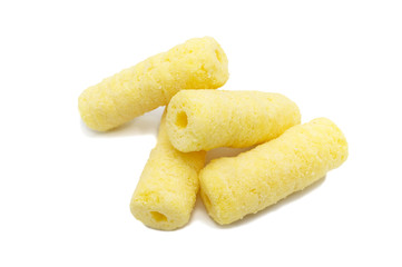 Handful of sweet crunchy corn sticks, snacks isolated on white background.