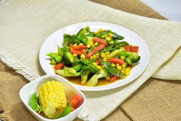 cooked vegetable on the white plate