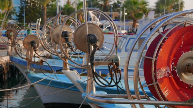 Fishing equipment on boats moored in Ayia Napa marina. Island of Cyprus.