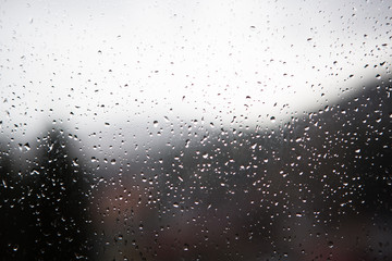 Blurred background of drops on the window. Abstract background.