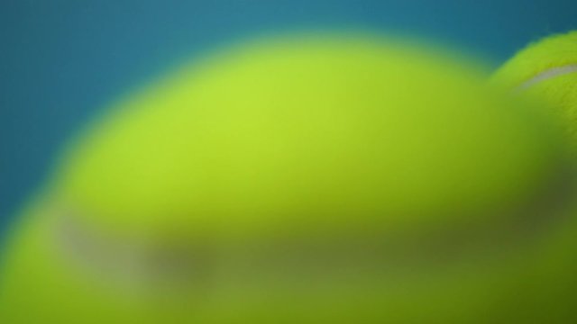 Tennis Ball On Color Background, Pan Shot For Title Or End Credit Clip