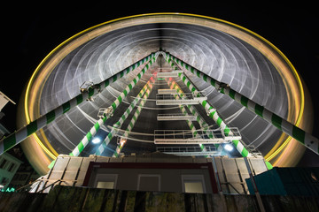 ferris wheel at night in basel switzerland
