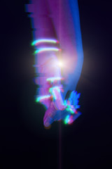 Man holds the hand of a robot created by digital technology. The friendship of man and technology.