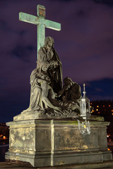 Fototapeta na wymiar christ sculpture @ carl bridge at night, Prague