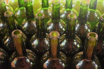 group of empty wine bottles