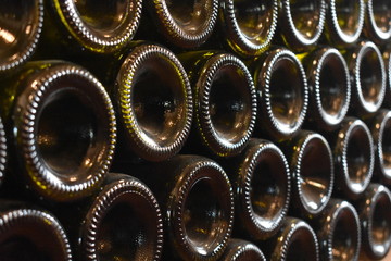 Wine bottles stored on a shelf