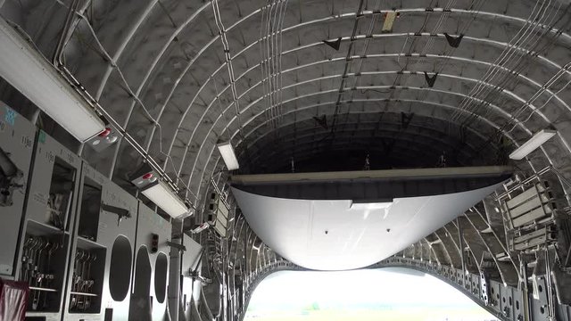 Slow Left To Right Pan Inside Military Aircraft For Carrying Troops And Cargo