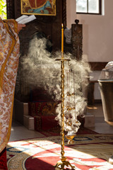 holy baptism , candlelight with smoke in church
