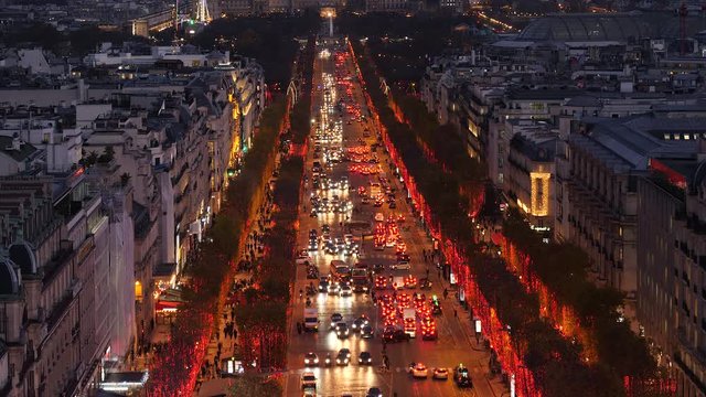 Paris, France. Aerial view of famous avenue Champs Elysee at night.