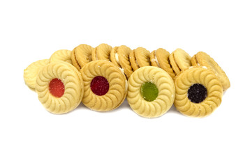 Biscuit sandwich butter cookies with cream and mixed fruits flavoured jam. A stack of crunchy delicious sweet meal and useful cracker. isolated on white background. Soft focus.