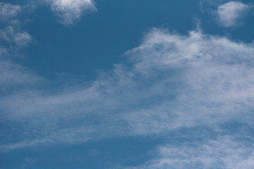 Obraz premium Abstract background with white clouds on blue sky