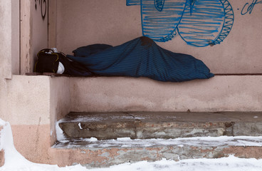 Sleeping homeless on the bus station.