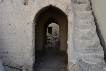 Fototapeta na wymiar Arabesque Archway with Stairs on Right, Nizwa, Oman