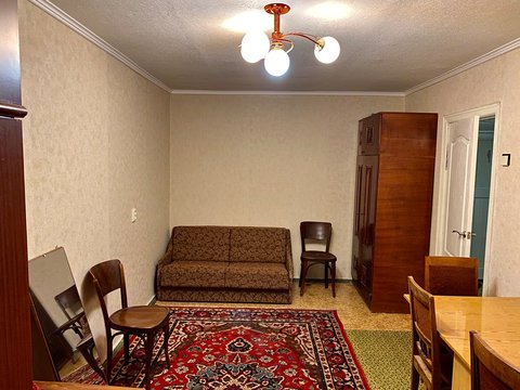 Old soviet living room with carpet
