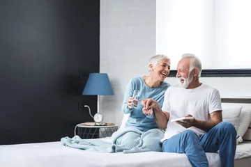 Fotobehang Elderly couple taking medication © focusandblur