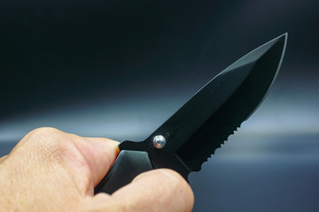 hand with knife