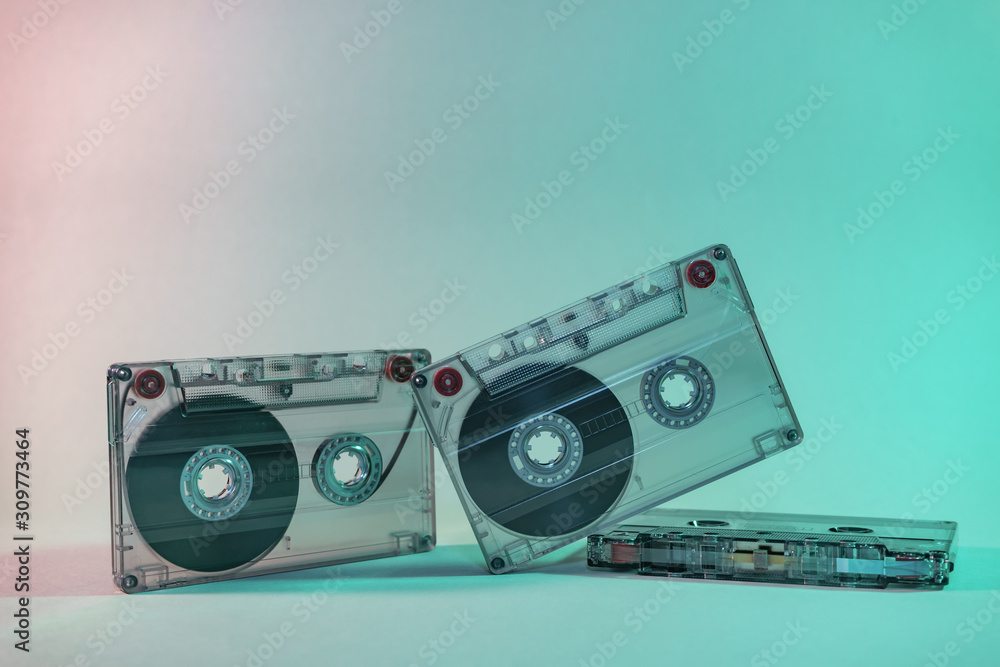 Aufkleber beautiful audio cassette tape in neon light.minimalism retro style concept. 80s. background pattern 