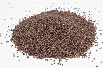 heap of brown mustard seeds