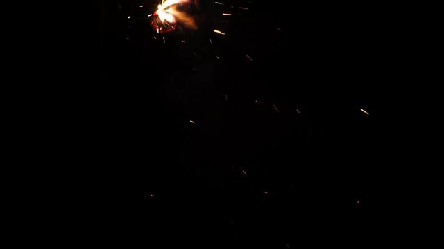 irework rotating through the frame on the ground. Firework for children