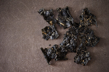 Seasoned seaweed snack on stone background  © mnimage