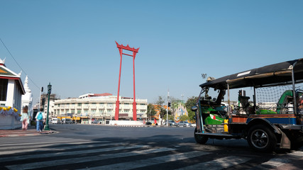 Naklejka premium tuk tuk park in area Sao Ching Cha or Giant Swing. Famous Landmarks in Bangkok City, Thailand