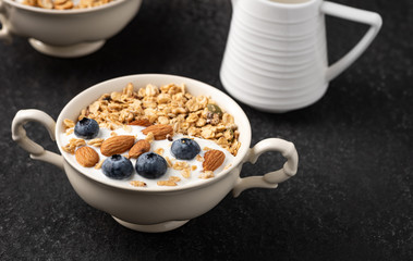 Granola, oatmeal with almond and berry food background