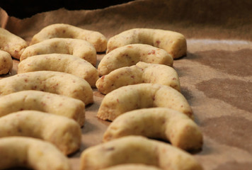 Freshly christmas rolls pulled from the oven and they cold on out air. Exposed pastry on baking sheet. Concept of happy christmas and New Year. Working together to create something