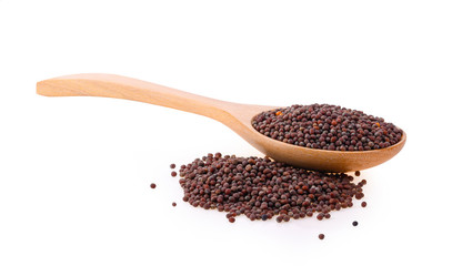 Brown mustard seeds on white background