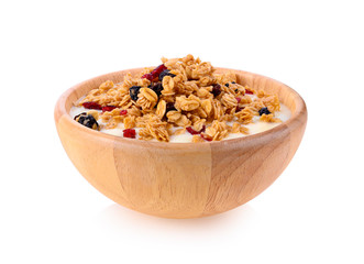 Yogurt with granola on white background