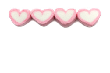 Pink sweet heart shape marshmallow isolated on white background.