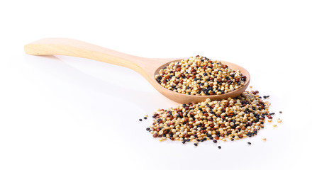 raw quinoa on white background
